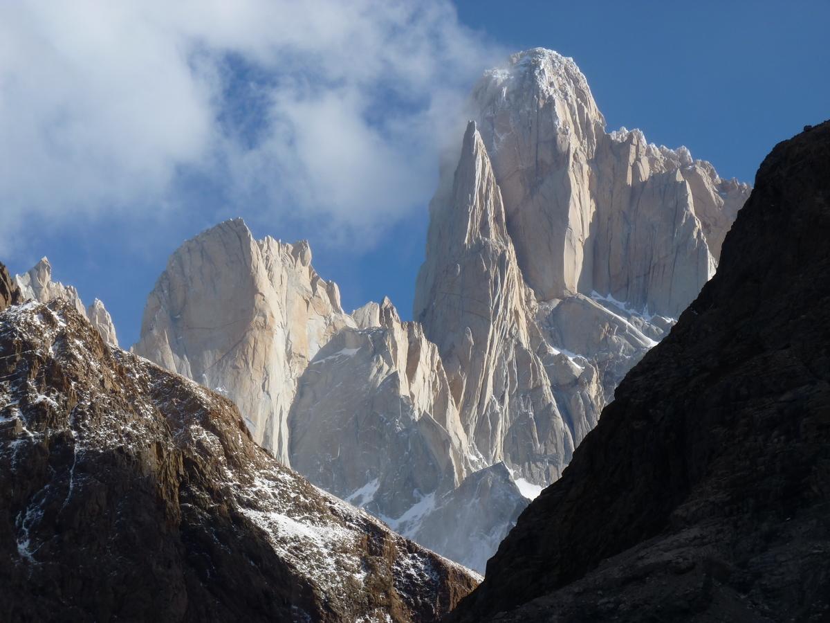 Mount Fitzroy rises above the Electrico Valley in the early evening light