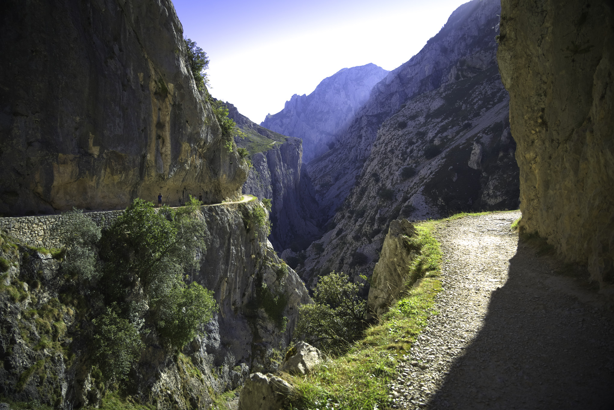 Two narrow paths to the right and left lead the eye into the narrow gorge that forms the Garganta de Cares.