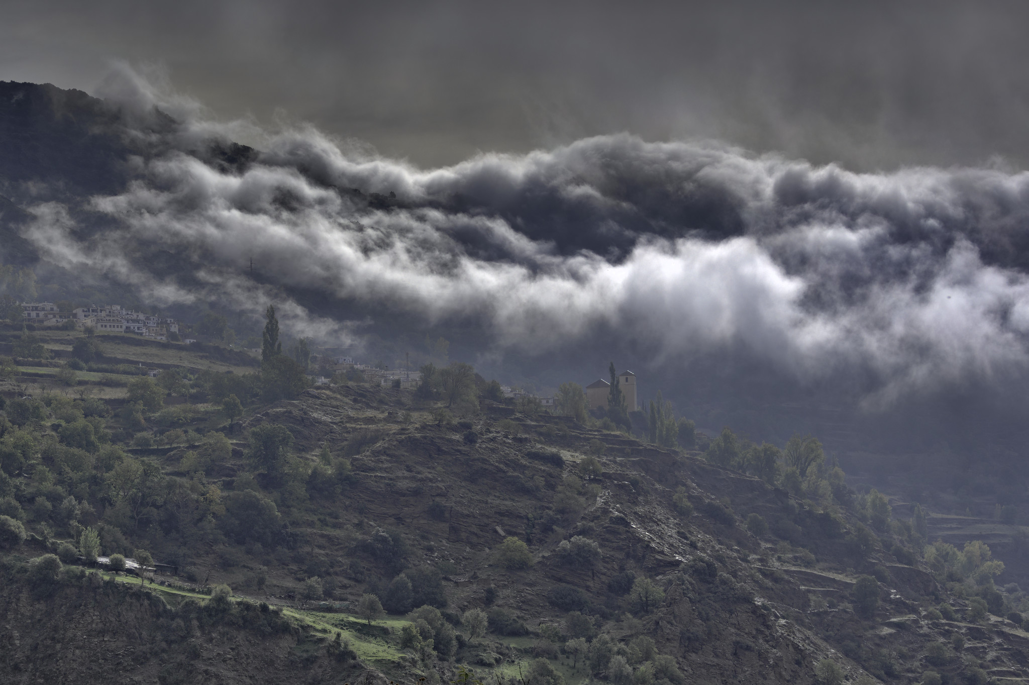 The clouds clearing rapidly from above Bubion
