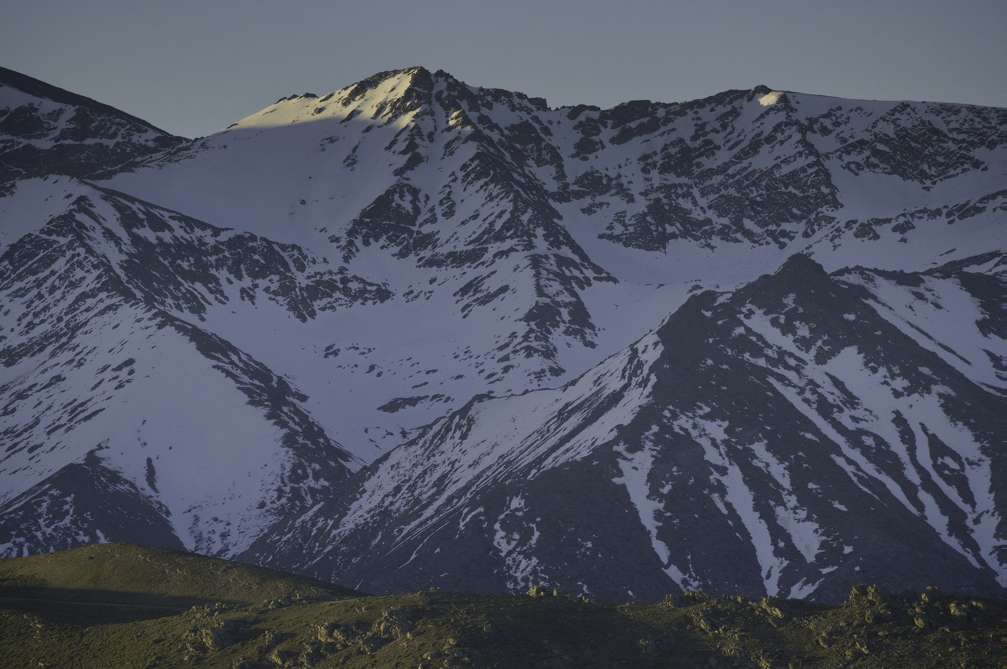The Puntal de la Caldera 3323m with morning sun reaching the summit