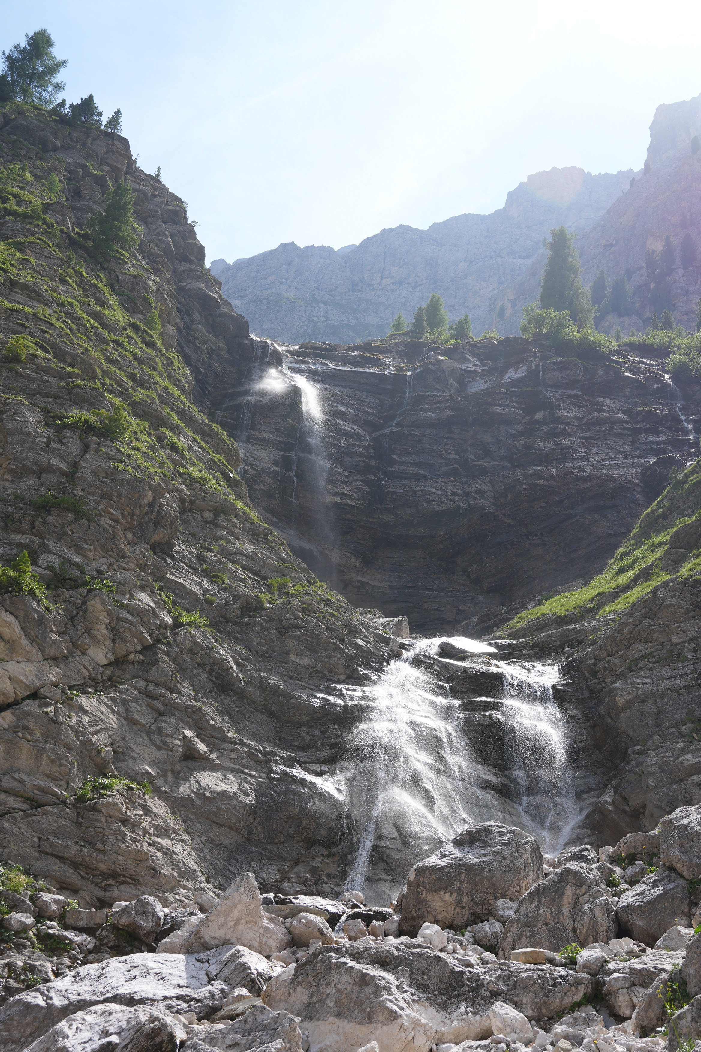 Waterfalls plunge over rock steps