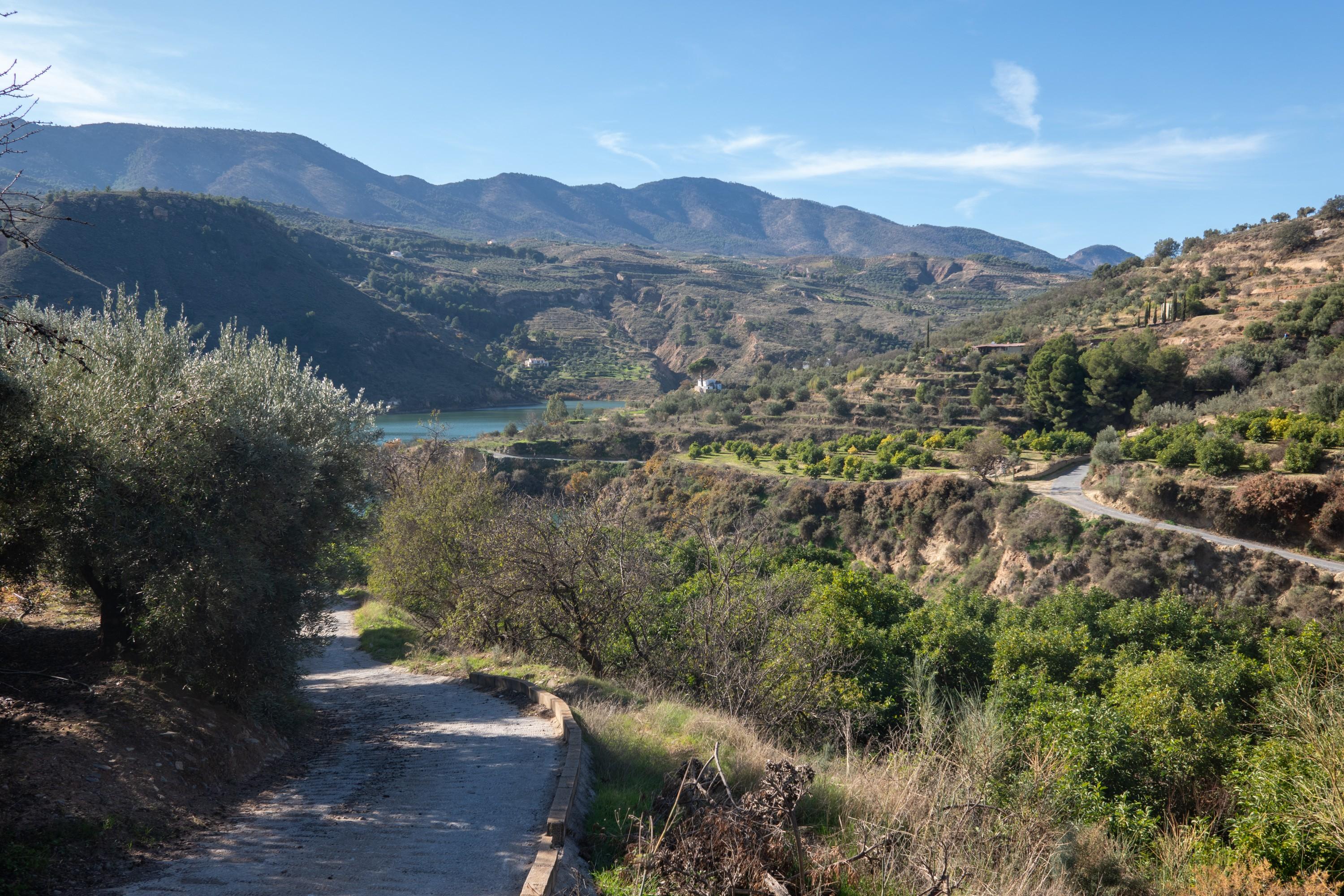 The hike back up the hill to Chite with views back to the Sierra de Almijara and Embalse de Beznar