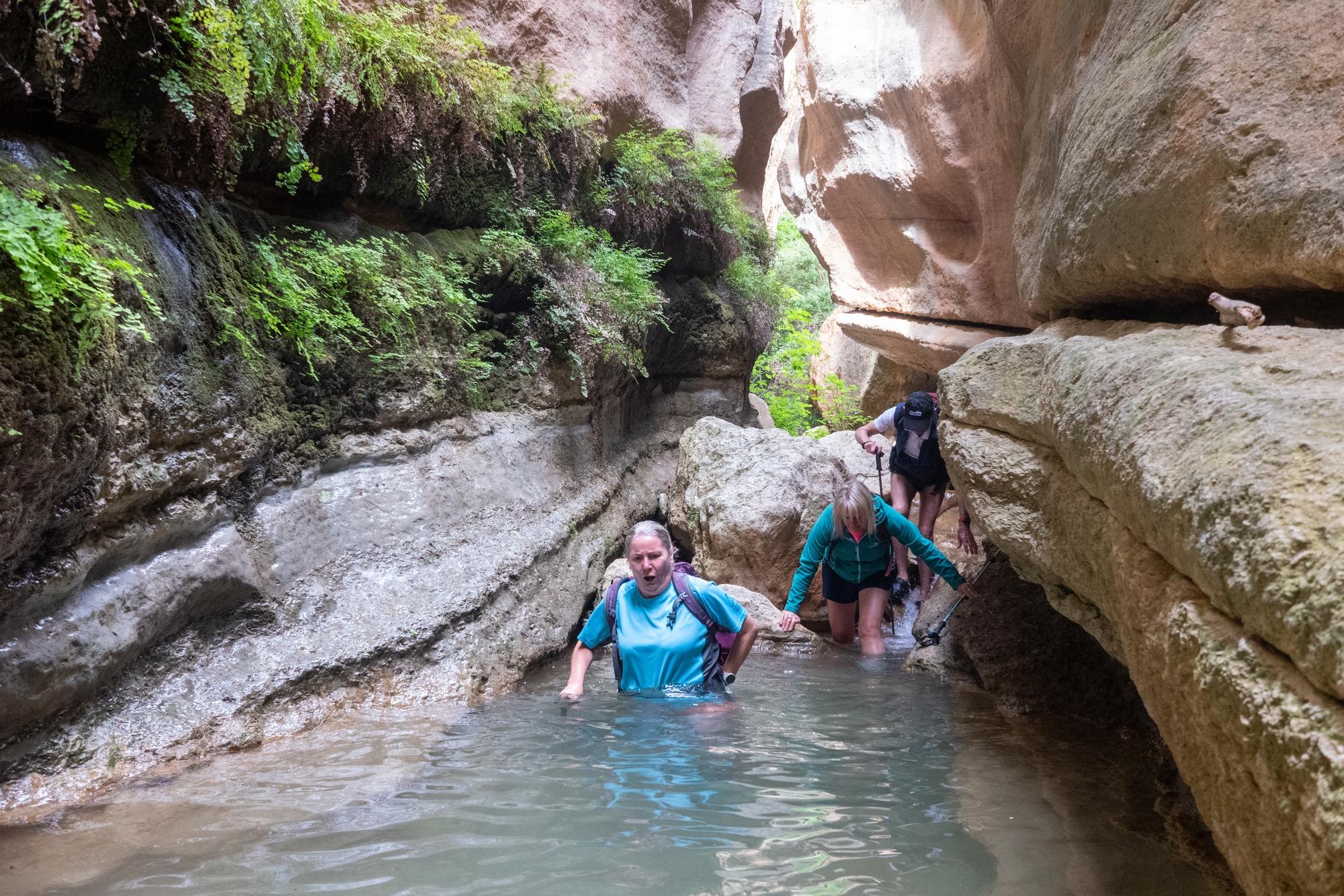 Unavoidable dip in a small pool. Huge rock walls above on both sides of the river