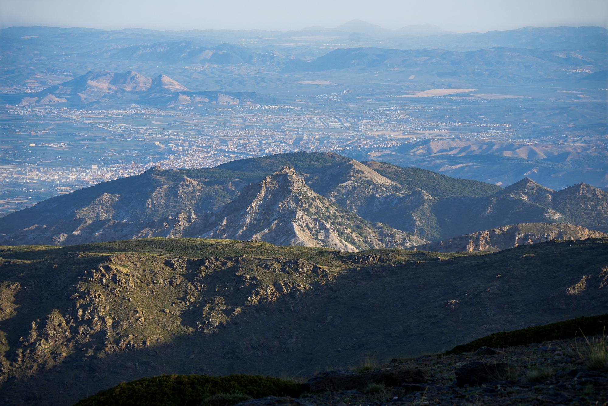 Trevenque and the Cerro Huenes group with the city of Granada behind and the Sierra Elvira to the top left