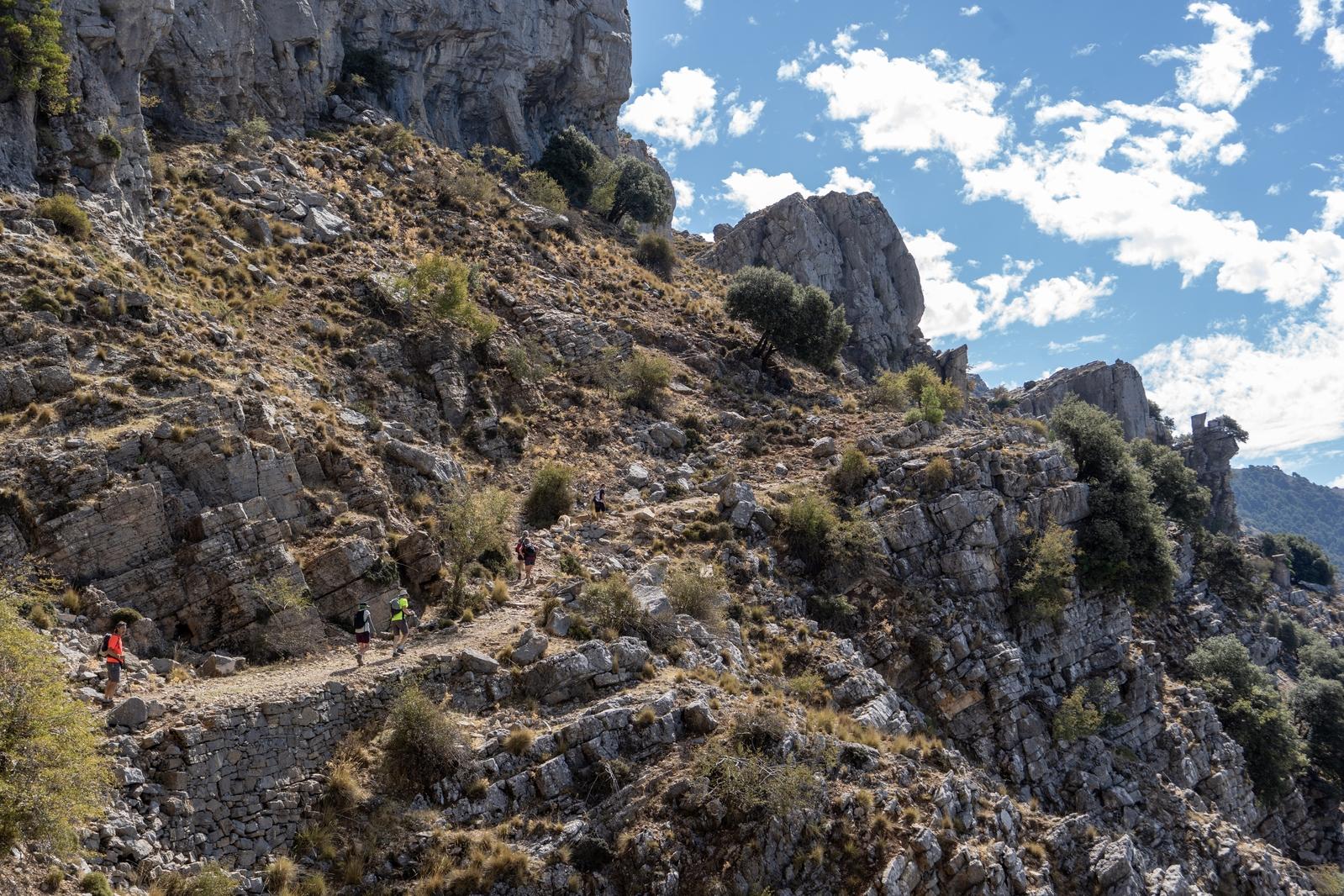 Our group ascend a traverse path leading to to the summit of Gilillo peak 1845m