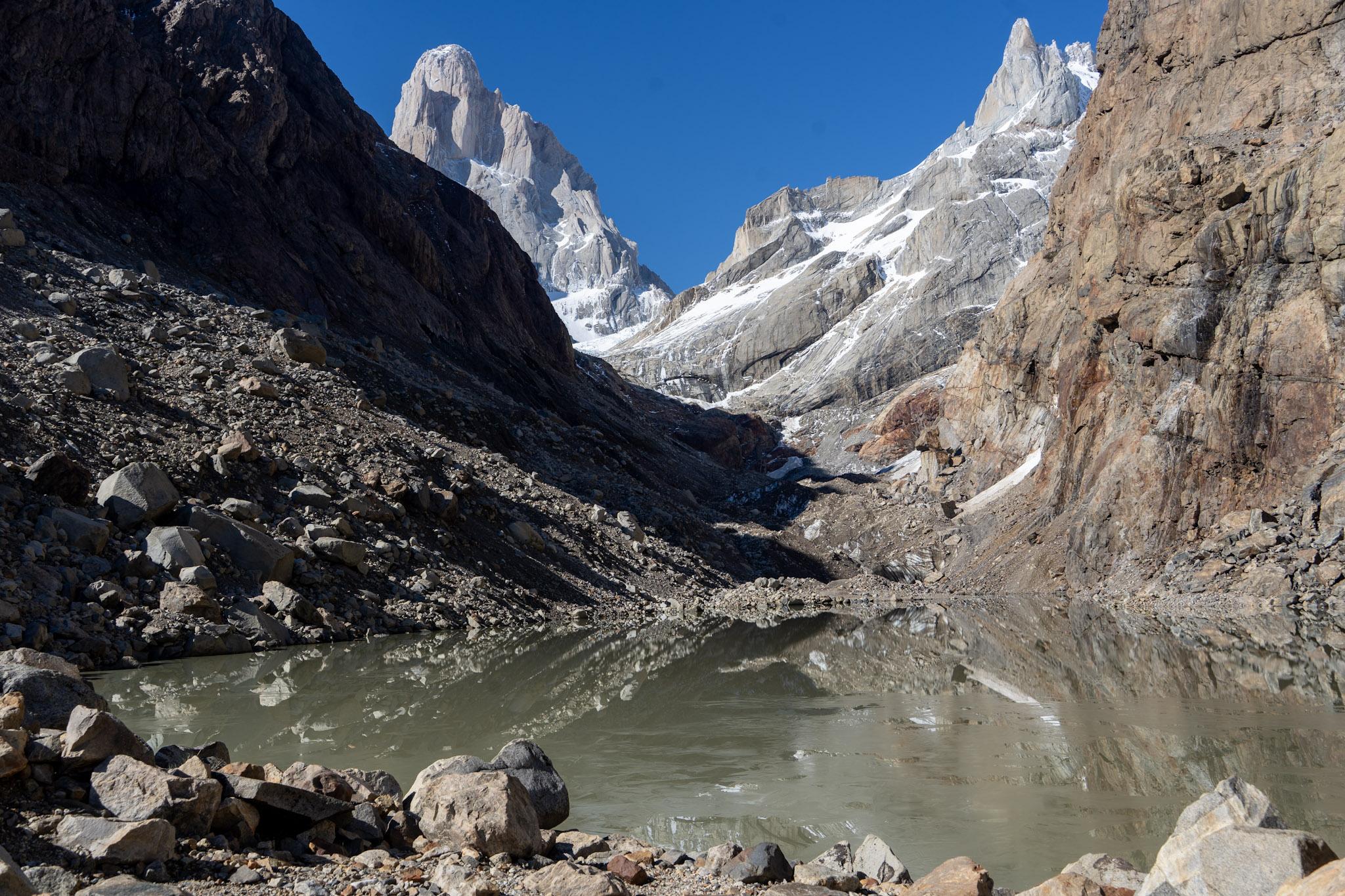 Fitz Roy and Cerro Pollone rise above the Fitz Roy glacier which flows into Laguna Pollone