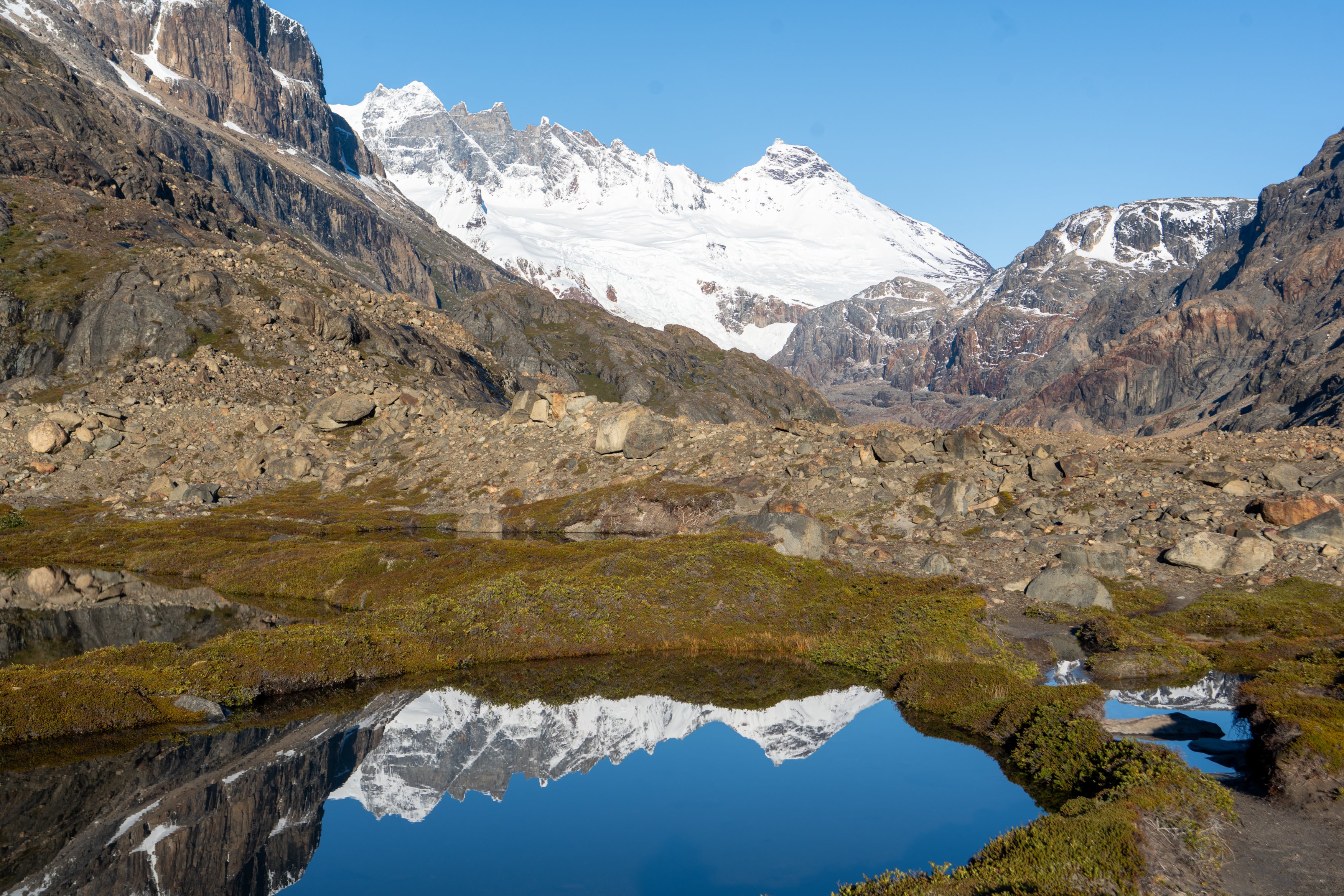 Cordon Marconi Group reflected in mountain lake